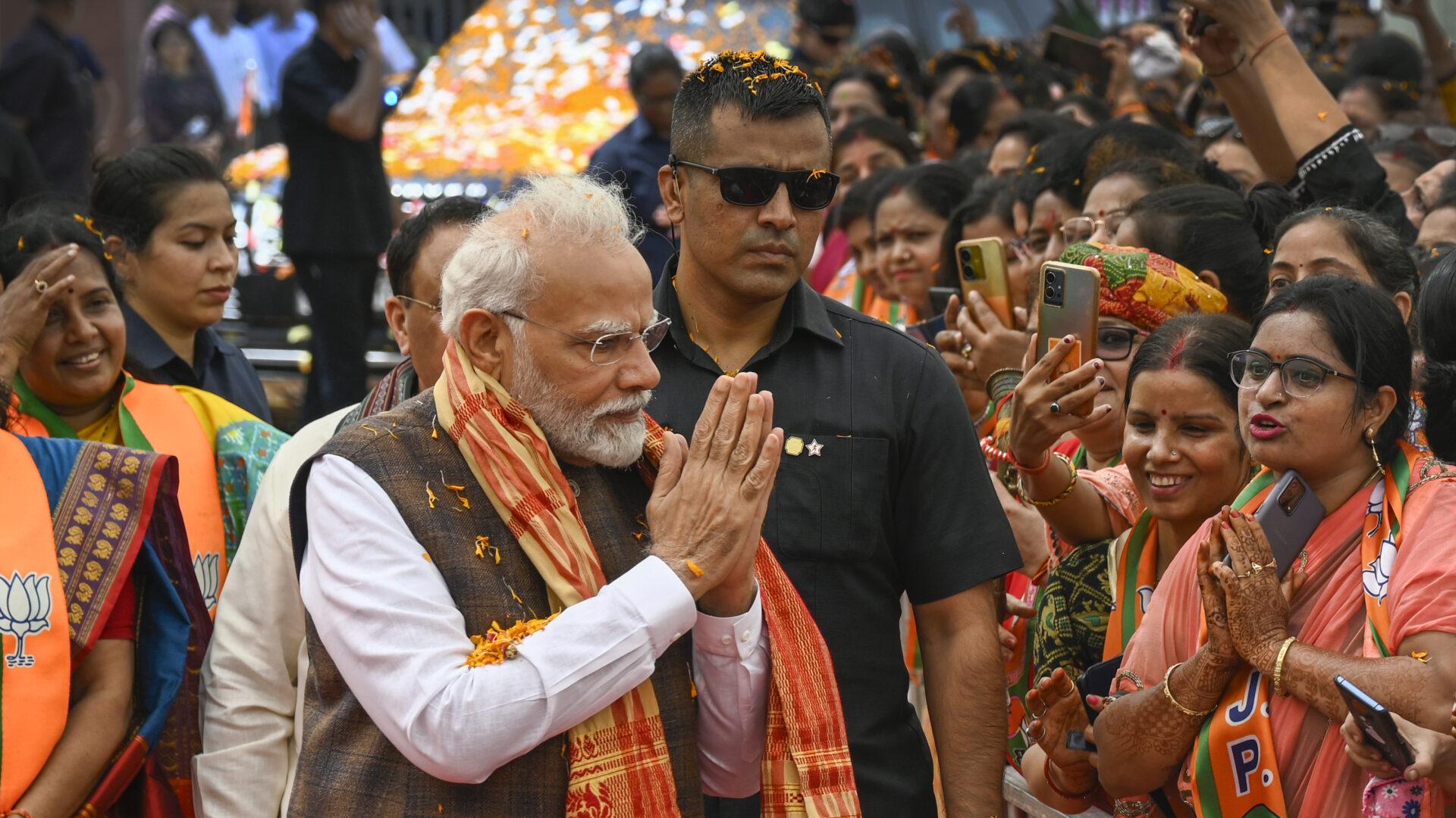 Narendra Modi greeting a crowd of supporters