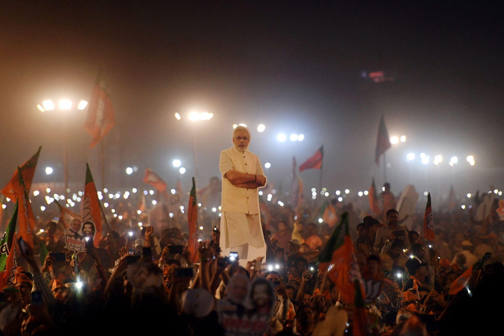 Narendra Modi addressing a large political rally at night